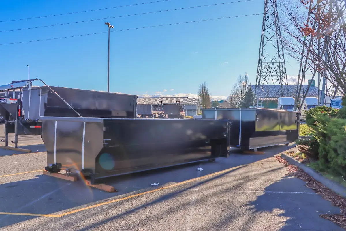 Roll-off dumpster ready for waste disposal at job site for Yard Waste Dumpster Rental in Champlain